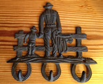 Cast Iron Cowboys at Fence Key Rack